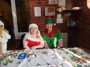 Our friendly Mrs Santa and Elf welcomed people to the Christmas Bazaar